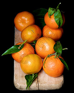 带叶子的饮食黑色水果食物生食橙子酸味橘子全身香味图片