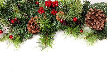 典型的圣诞装饰园地松树浆果叶子装饰品树叶花圈风格礼物花环塑料图片