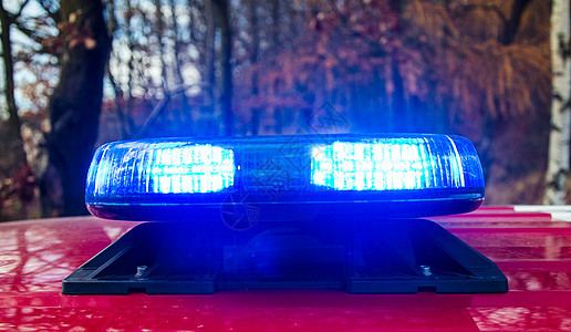 消防引擎灯车辆情况救护车蓝色危险部门消防队员行动街道消防车图片