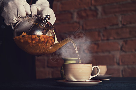 与海角泡茶蓝色浆果叶子杯子药品季节食物蜂蜜茶壶植物图片