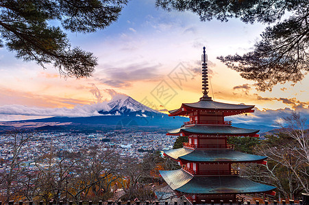 富士山和日本日落时的丘瑞托帕果达等美丽的地标神社宝塔叶子天空浅间旅行寺庙火山神道樱花图片
