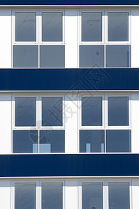 蓝色建筑摩天大楼办公室财产街道窗户城市景观商业技术太阳图片