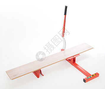 切割压层的红色工具木头压板职业刀具房间仪表地板安装测量木工图片