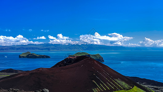 冰岛韦斯曼纳伊贾尔群岛海梅岛的全景埃尔德费尔火山图片