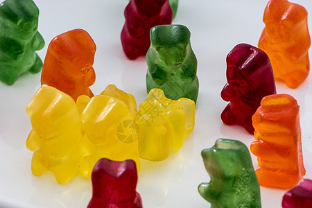 甜美熊的近身拍摄孩子们口香糖食物形状软糖小吃字母团体糖果饮食图片