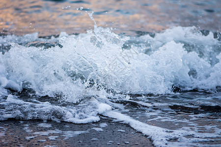 波浪的近距离拍摄海浪石头热带旅行海滩海岸海洋蓝色水平白色图片