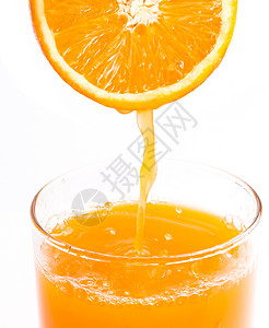 挤压的橙汁展示 以更新健康与新鲜事物图片
