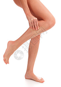 近距离拍摄着女性的紧身镜头 她手脚痛 被白背面孤立白色痛苦伤害药品肌肉治疗疼痛按摩皮肤卫生图片