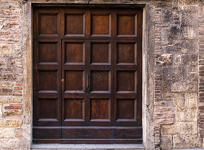中世纪的墙窗窗户房子木头棕色框架城堡石头建筑学城市古董图片