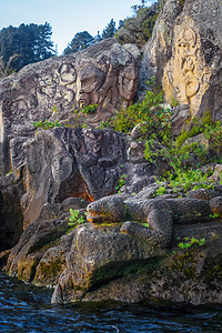 毛利人岩石雕刻 新西兰陶波湖风景岩画文化天空火山地平线旅游艺术石头旅行图片