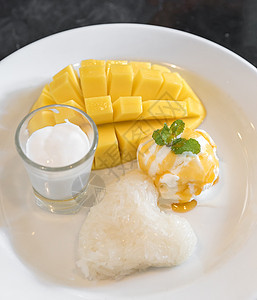 芒果加粘糊米饭糯米黄色托盘坚果热带食物冰淇淋甜点椰子水果图片