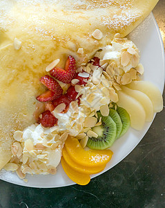 外来水果粪便e冰淇淋饼子香蕉糖浆早餐浆果红色食物异国情调图片