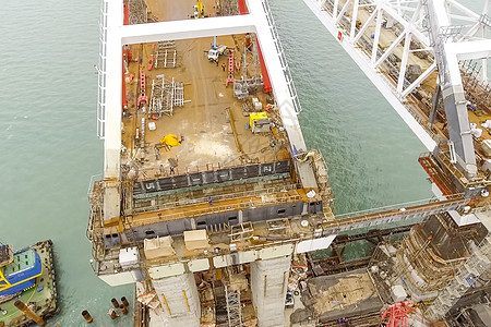 桥梁的建造 两岸铁路汽车大桥建设工程设施结构保险建筑直升机色标职业机械石油工作平台图片