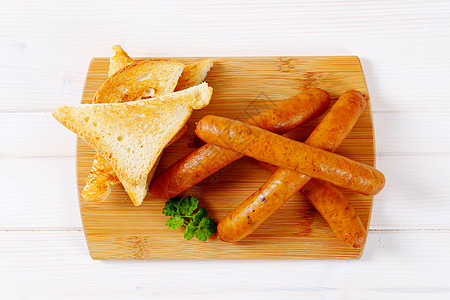烤面包薄香肠面包高架食物盘子三角形午餐砧板图片