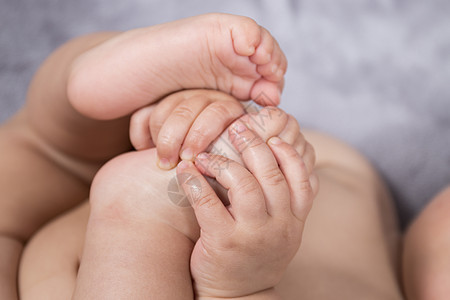 婴儿脚和手身体脚趾孩子拇指童年手指生活脆弱性青年家庭图片