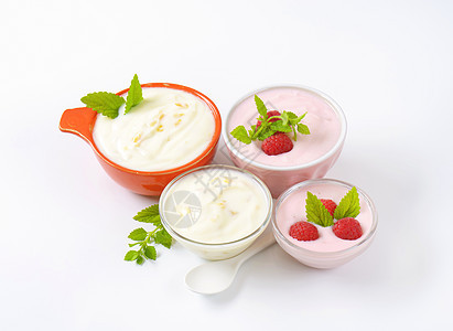 水果酸奶碗奶制品奶油薄荷粉色甜点橙子勺子白色绿色覆盆子图片