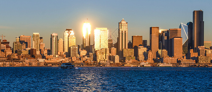 西雅图的西雅图市风景日落旅游全景建筑物海洋城市阳光摩天大楼天际景观图片