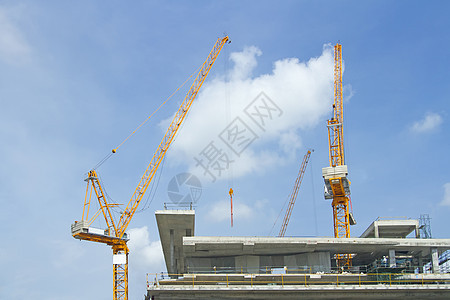 许多正在建造的高楼和Cran大楼的内置建筑项目蓝色工程城市建筑学工作建筑物起重机石头天空图片