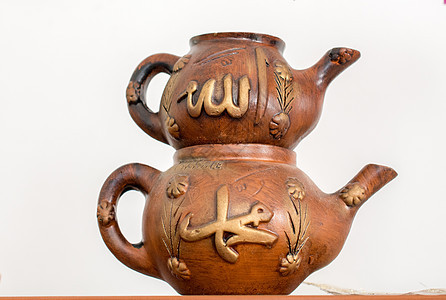 土耳其茶壶 以传统风格制成绘画石榴历史食物古董液体金属咖啡火鸡饮料图片