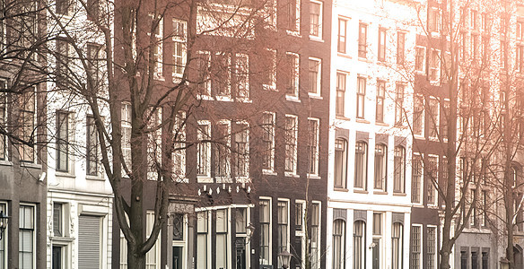 阿姆斯特丹街头 荷兰阿姆斯特丹历史中心的狭窄住宅景观建筑建筑学旅行财产房子首都传统游客天空旅游图片