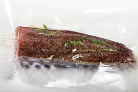 猪肉片在苏斯的包里食物牛肉牛扒视频烹饪小袋迷迭香塑料香料卡盘图片
