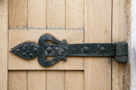 装饰性门锁着房子铸铁铁工木头金工风化螺旋入口装饰品古董图片