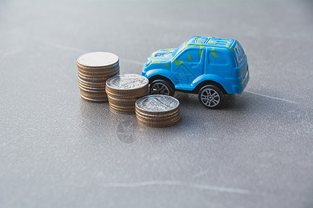 汽车保险和汽车服务概念 商业概念 汽车在财富收益金融维修货币投资硬币注意力保修单运输图片