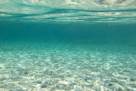 水下海洋观察背景海景海浪射线蓝色海滩卵石绿色太阳热带阳光图片