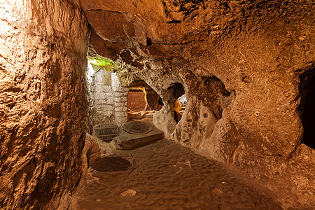 德林丘尤的地下城市遗产洞穴石头观光火鸡古董考古学房间墓穴文明图片