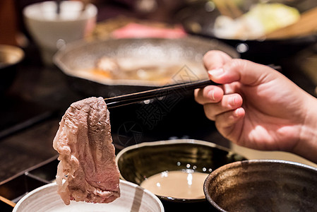 Matsusaka牛肉食物盘子筷子芝麻烹饪用餐橙子洋葱美食图片