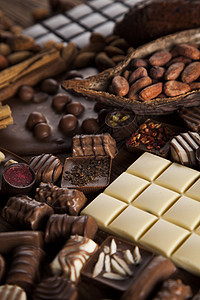 木制桌上的黑巧克力和牛奶巧克力棒乡村地面美食甜点粉末食物可可木头巧克力桌子图片