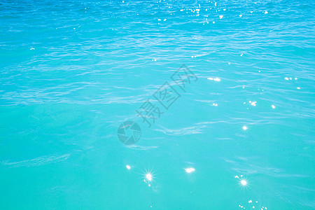 海洋水面海浪液体涟漪水池波纹阳光晴天热带蓝色图片