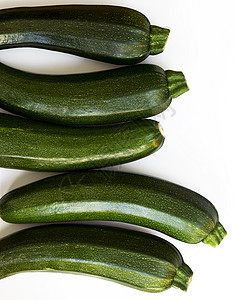 白色背景的Zucchini苏切蒂 椰菜阴影水果绿色黑色颜色浆果末端皮肤蔬菜深绿色图片