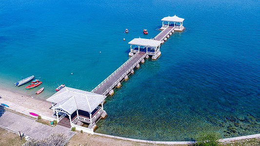 泰国岛的木材水边展厅空中观察海滩海景木头港口海洋海浪建筑学吸引力海岸游客图片