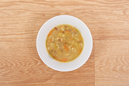 汤加面粉和蔬菜在桌子上面包餐厅土豆盘子贝壳勺子午餐萝卜肉汤饮食图片