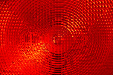 红色多面塑料的抽象背景玻璃弹射大灯信号活力警告反光板尾灯图片