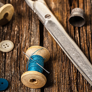 线和缝纫配件工艺工具纺织品爱好蓝色材料剪刀木头橙子维修图片