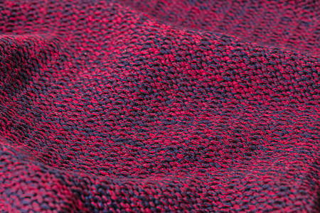 背景羊毛针织面料衣服毛衣针织品纤维红色棉布材料编织装饰宏观图片
