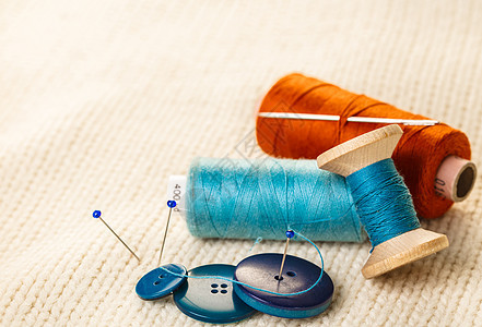 彩色线和按钮衣服蓝色工具维修卷轴棉布手工工作配件配饰图片
