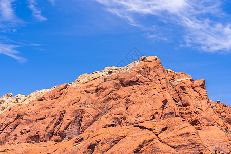 拉斯维加斯红岩峡谷低压岩石蓝天地标太阳沙漠砂岩悬崖梯形旅行图片