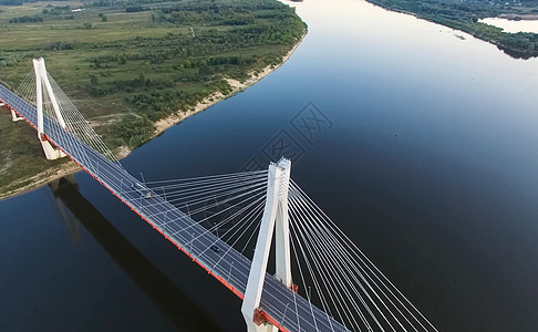 河上美丽的桥 电缆上的桥是路道日落天空建筑建造道路地标行人绳索建筑学灯笼图片