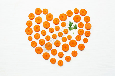 被切碎的胡萝卜片 心脏形状和鹦鹉叶食物立方体芹菜橙子水果美食叶子萝卜洋葱饮食图片