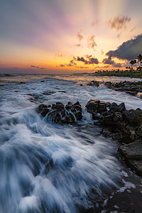 Kauai夏威夷海滩日落岛屿热带海洋运动海湾阳光海岸游客支撑波浪图片