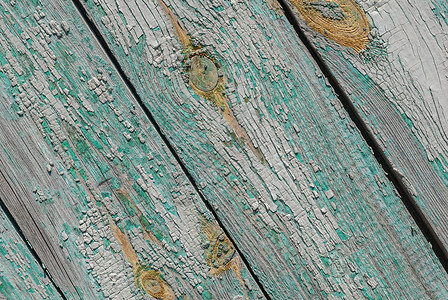 旧木质表面 有裂缝和剥皮涂料 薯片油漆 绿绿石纹理 背景图片