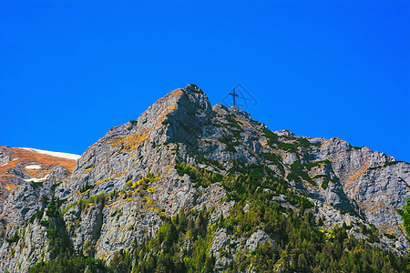 布塞吉山的卡拉曼峰岩石爬坡山坡石质山脉悬崖高地英雄十字顶峰图片