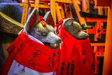 日本京都的狐头雕像旅行历史旅游神社狐狸地标避难所观光雕塑神道图片