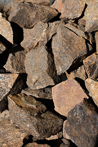 Bronzite 宝石作为天然矿物岩石珠宝青铜晶洞石头棕色烟晶标本玉髓辉石折射图片