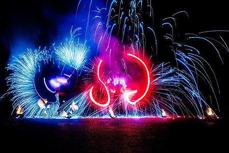 火光闪耀的烈火碎片活力节日舞蹈娱乐圆圈橙子运动舞蹈家燃烧旋转图片