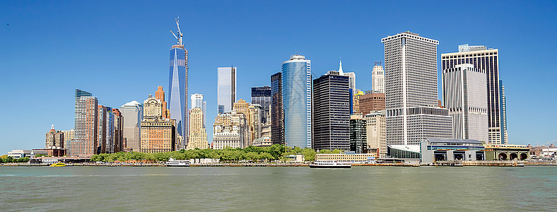 美国纽约市曼哈顿天线风景城市办公室码头球衣渡船日落建筑帝国市中心图片
