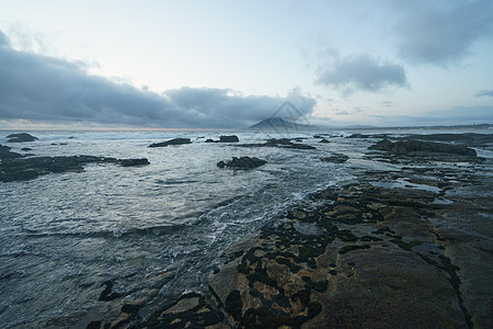 日落时的海洋海岸支撑地平线风景水坑波浪魔法薄雾蓝色旅行地球图片